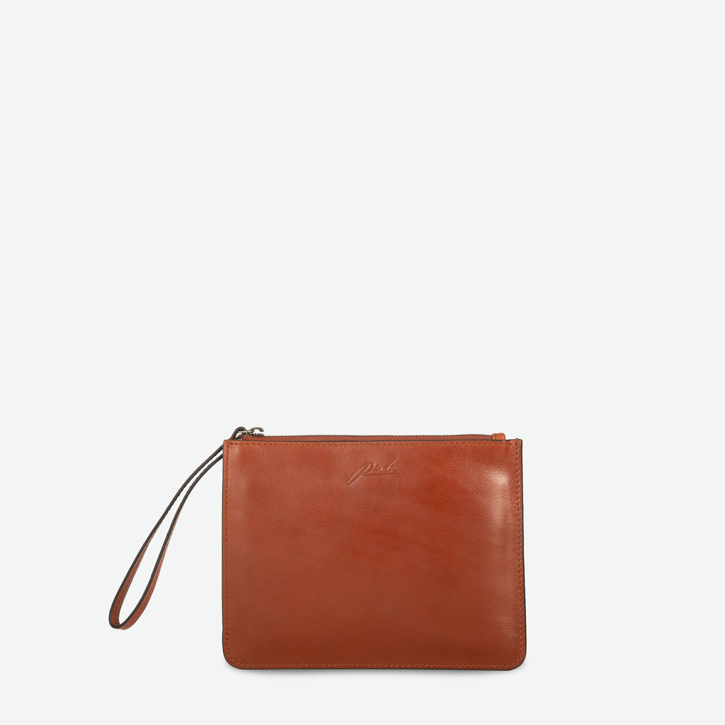 A chestnut brown rectangular  zip up pouch clutch with leather wristlet - image 1
