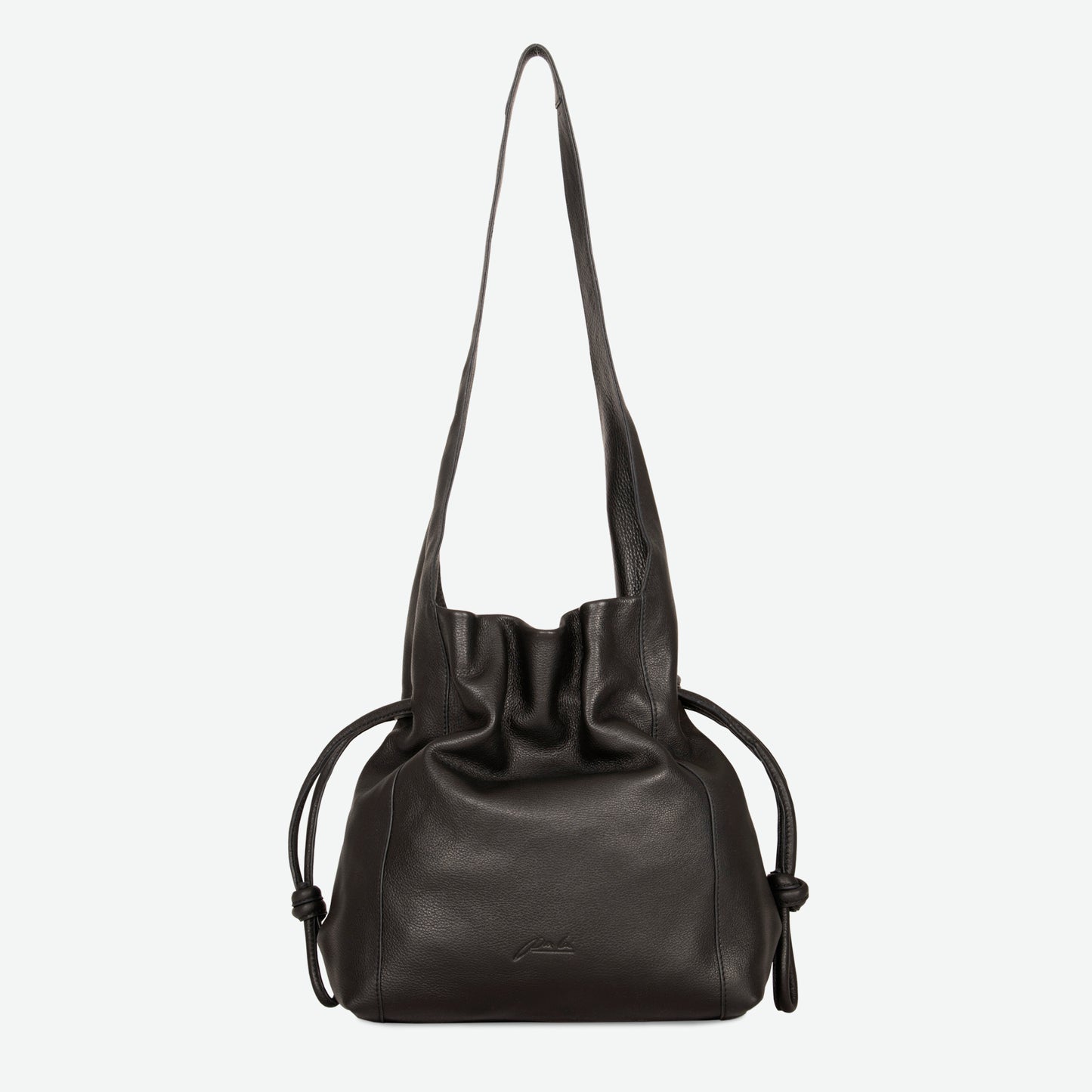 Black smooth leather shoulder bag with drawstring cinch top, single strap, and magnetic closure.