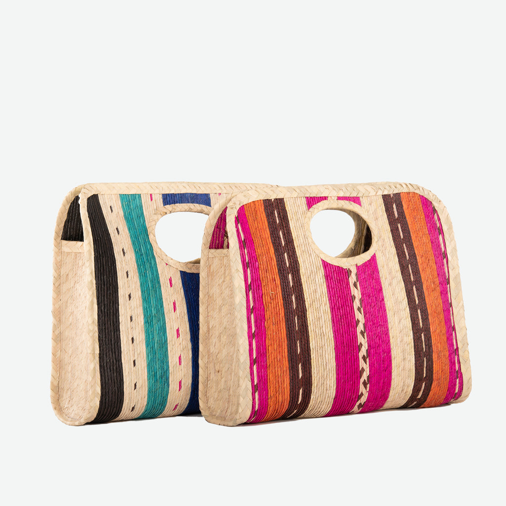 A pair of square straw beach totes with vertical stripes