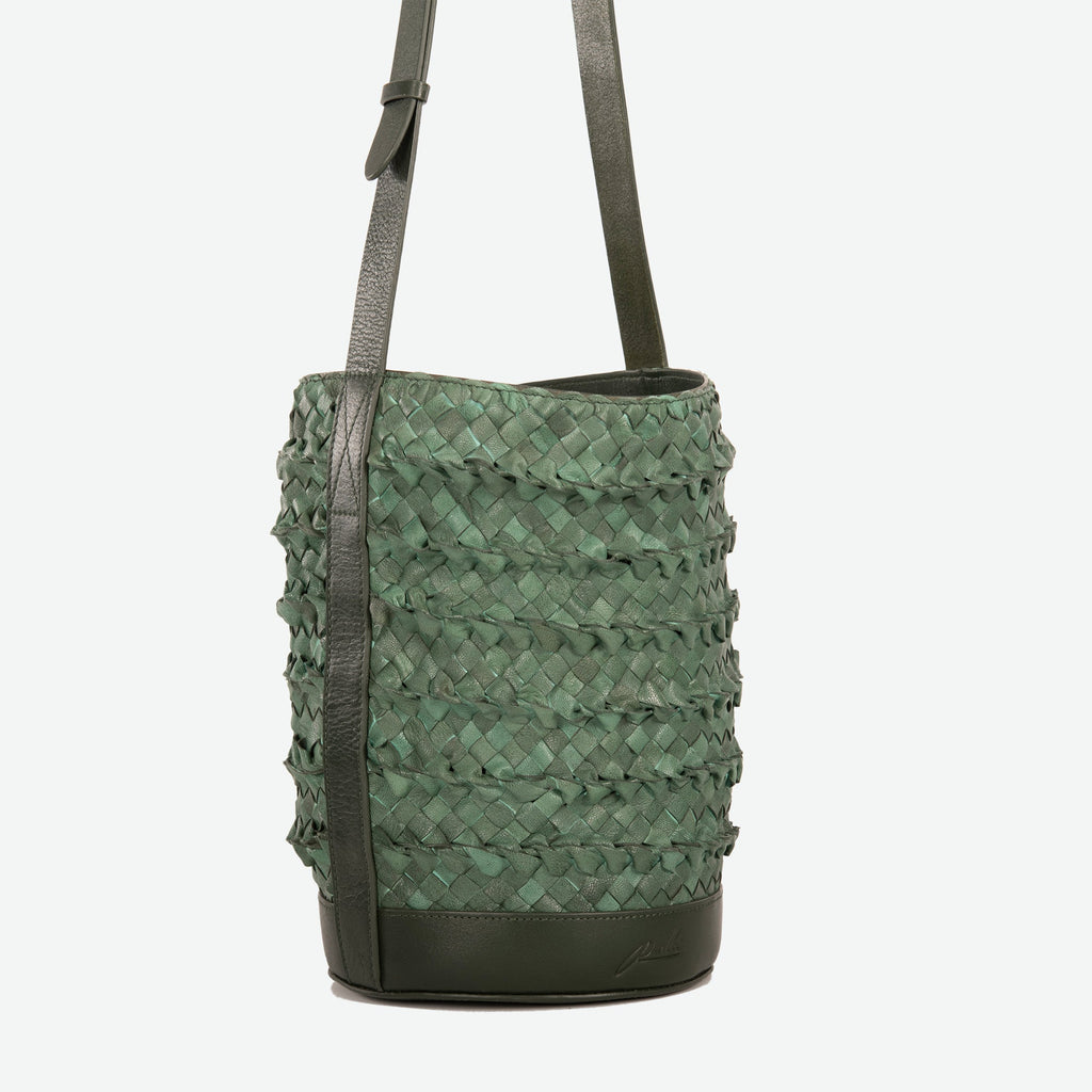 A pine green woven leather bucket bag  with an adjustable shoulder strap - image 2