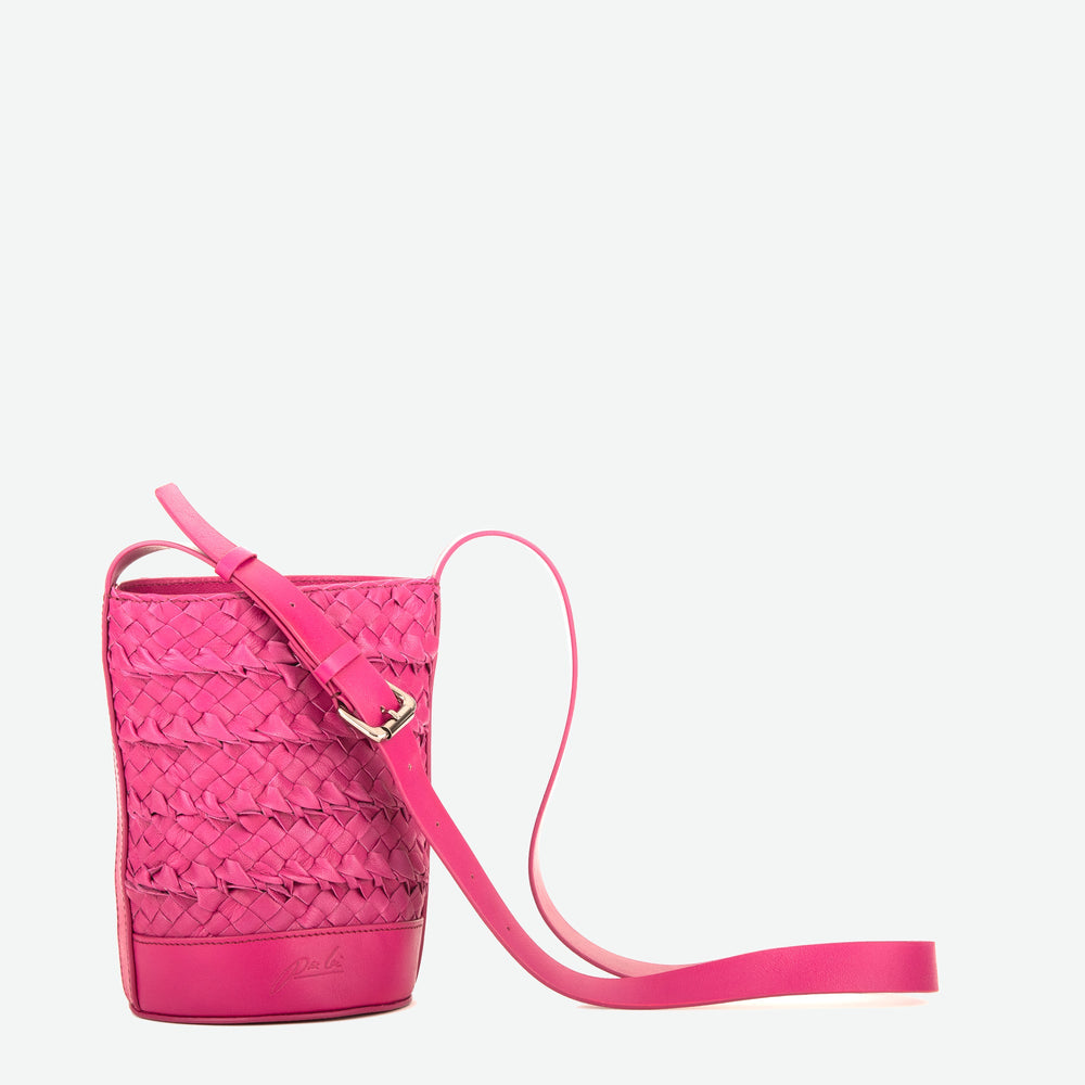 
                  
                    A mini small orchid pink woven leather bucket bag  with an adjustable crossbody strap - image 5
                  
                